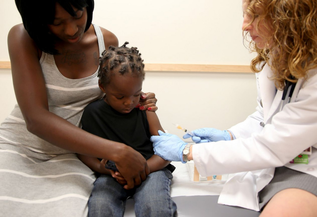 053014 health rewind Measles child doctor vaccine