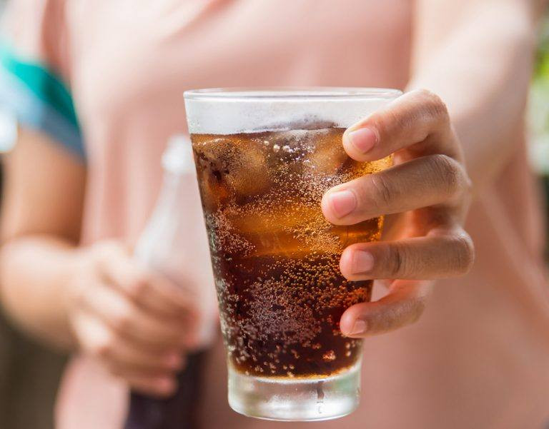 Glass of cola with ice. 768x601